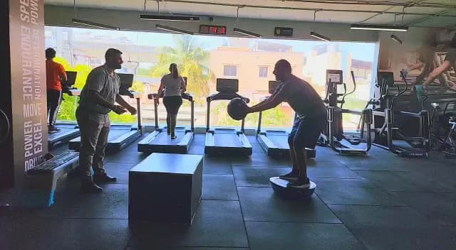 Patient doing balance and strength rehab under supervision