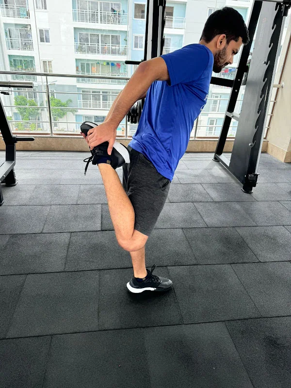 Patient doing a guided quadriceps stretch